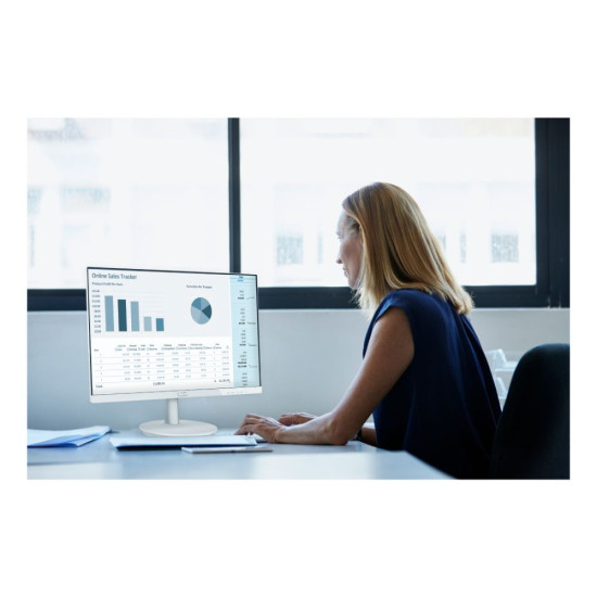 Philips V Line 241V8AW/00 23.8" Full HD IPS 75Hz Monitor used by a business women on her office table. The screen shows chart and graphs and the monitor looks quite sleek.